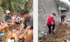 PEMULIHAN Petugas Telkomsel melakukan kabel FO yang putus